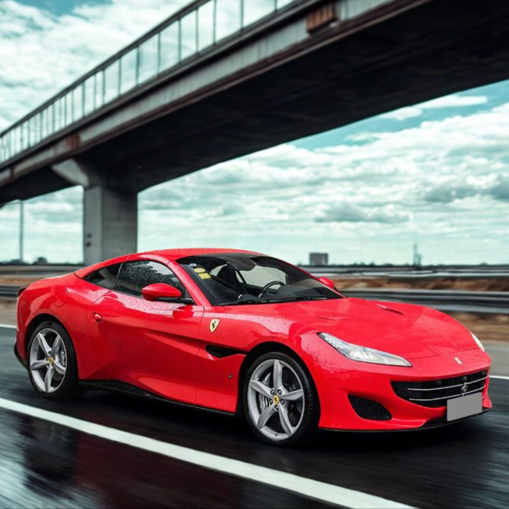 Red Ferrari with PROKHAR Lumeia™ Glow Effect PPF, Premium Luminous Finish Paint Protection Film for Daily Drivers.